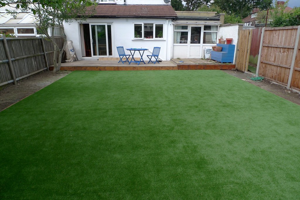 An artificial grass lawn in a back garden